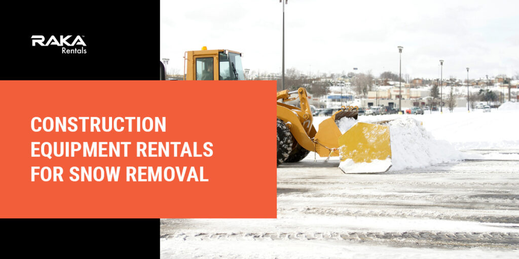Front-end loader pushing snow to clear off a parking lot.