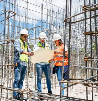 workers looking at plans